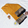 Mangalagiri Cotton Saree With Zari Woven Black Border In Mustard Yellow, Neatly Folded Flat Lay View
