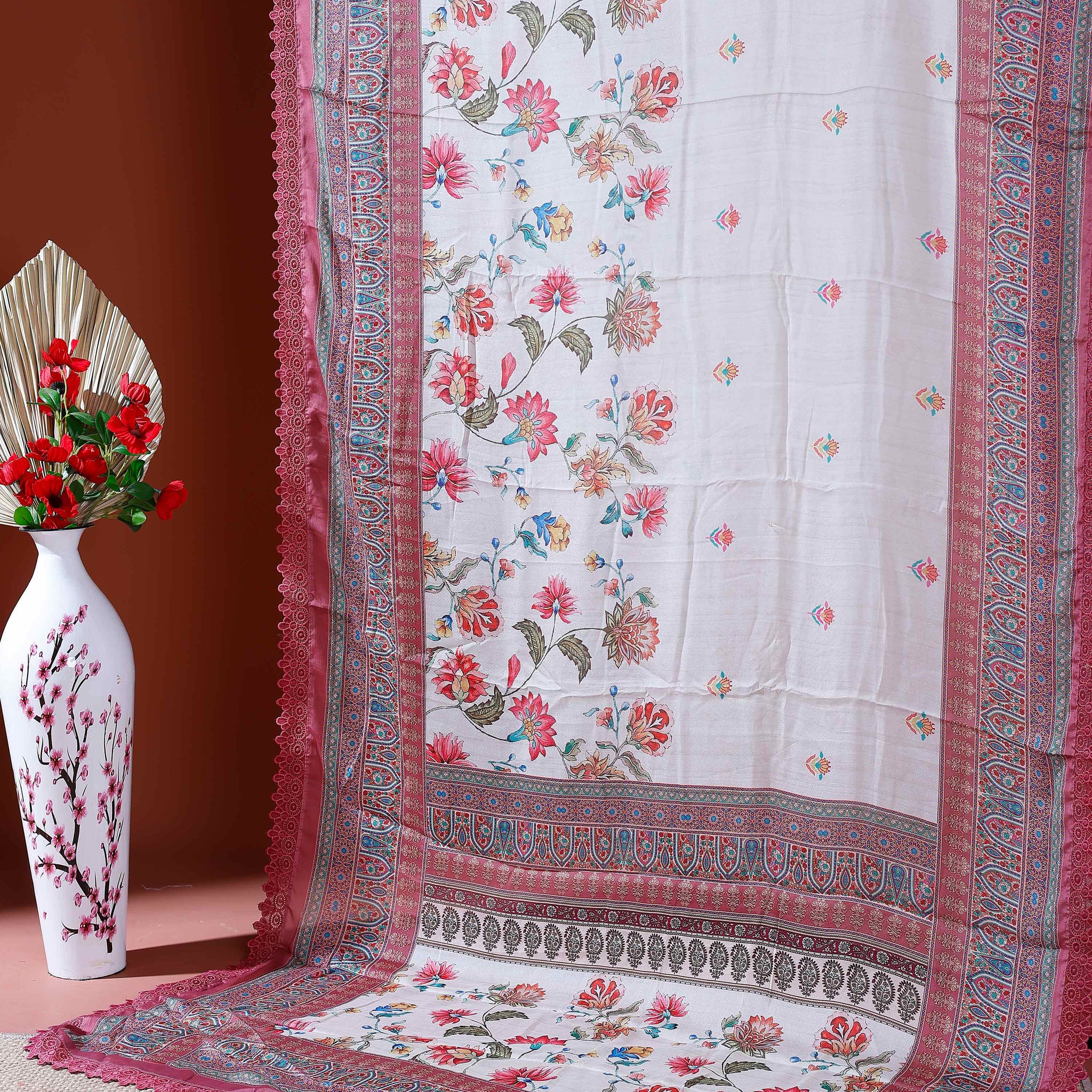 Elegant Georgette Saree with Intricate Floral Embroidery and Traditional Patterned Border - Cream