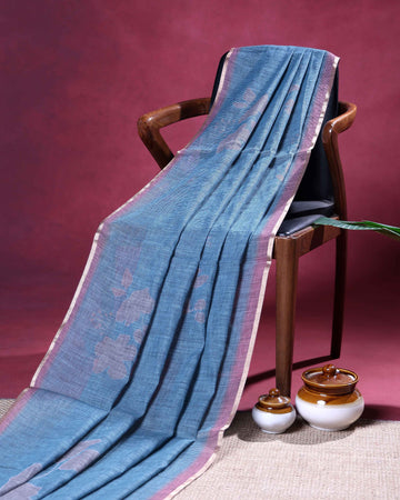 Elegant Linen Blend Saree with Subtle Floral Buta Motifs and Traditional Contrast Woven Border - Pastel Blue