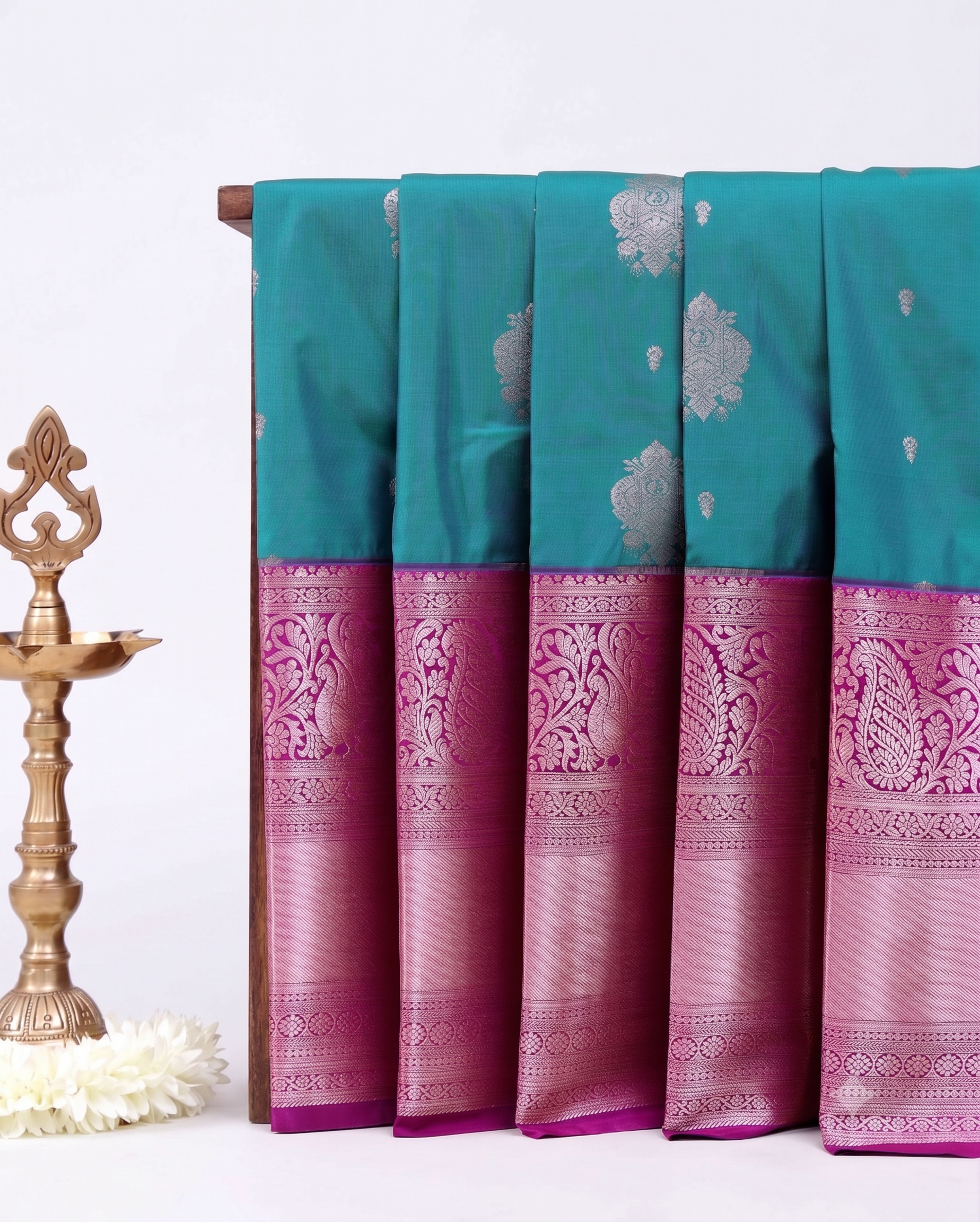 Elegant Niranjana Silk Saree with Intricate Floral Brocade Weaving and Rich Contrast Border - Teal