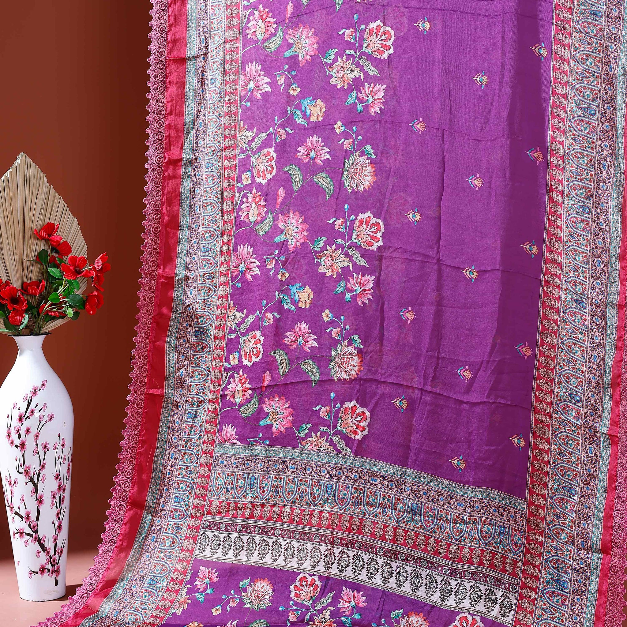 Elegant Georgette Saree with Intricate Floral Embroidery and Traditional Patterned Border - Purple