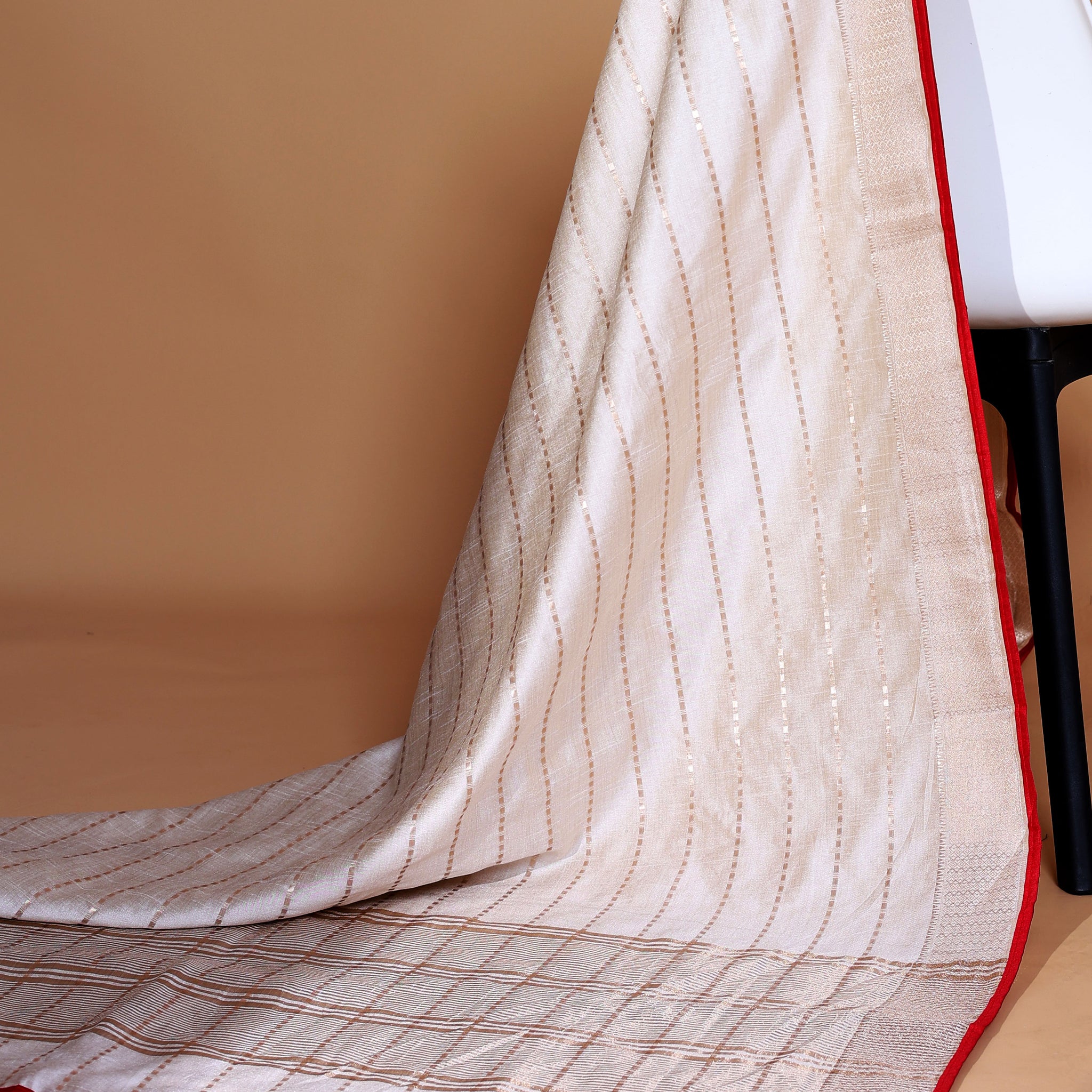 Stylish White Art Silk Saree with Golden Lines and Traditional Tassels Without Blouse