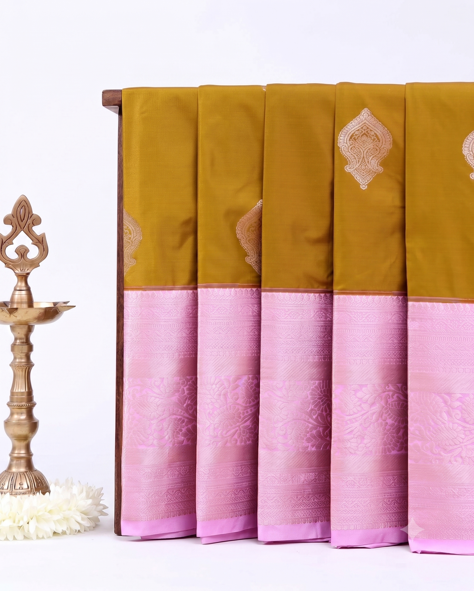 Elegant Niranjana Silk Saree Adorned with Refined Butta Design and Ornate Zari Border - Olive Green