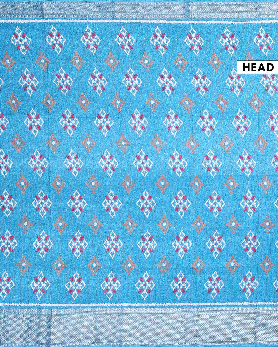 Elegant Dola Silk Saree with All-Over Ikkat Inspired Geometric Butta Motifs and Rich Traditional Zari Woven Border- Blue