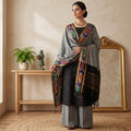 Black Cotton Salwar Material With Striped Weave Grey Dupatta And Striped Border Front View
