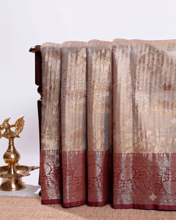 Elegant Niranjana Silk Saree with Intricate Zari Weaving and Contrasting Floral Border - Brown