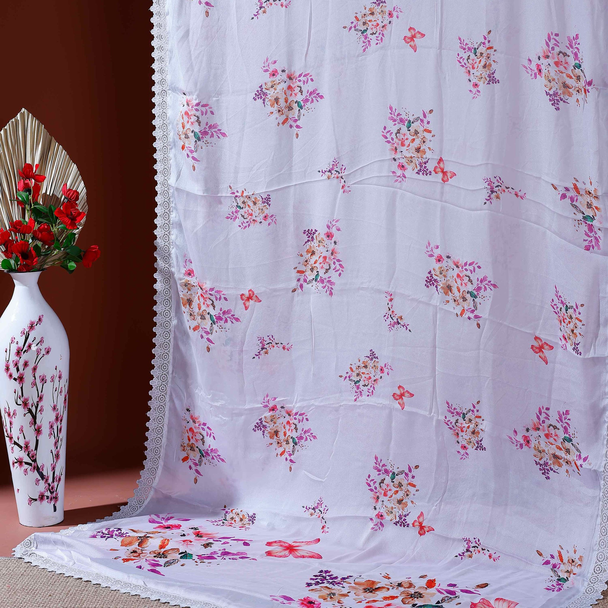 Elegant Georgette Saree with Delicate Floral Prints and Intricate Lace Border - Lavender