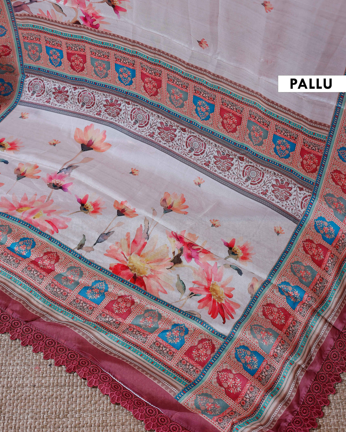 Elegant Georgette Saree with Intricate Floral Embroidery and Traditional Patterned Border - Cream