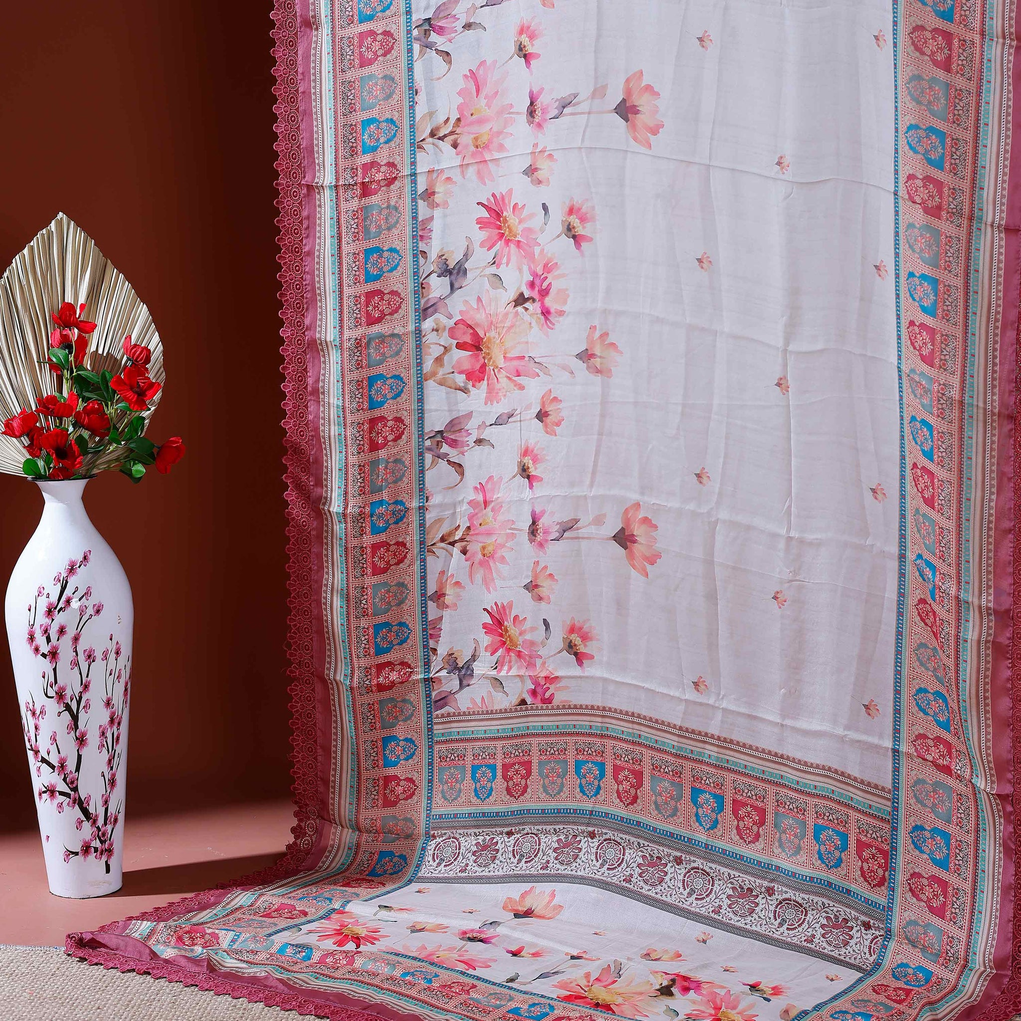 Elegant Georgette Saree with Intricate Floral Embroidery and Traditional Patterned Border - Cream