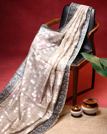 Elegant Linen Tissue Saree With Abstrack Weave and Contrast Kalamkari Inspired Border - Off White