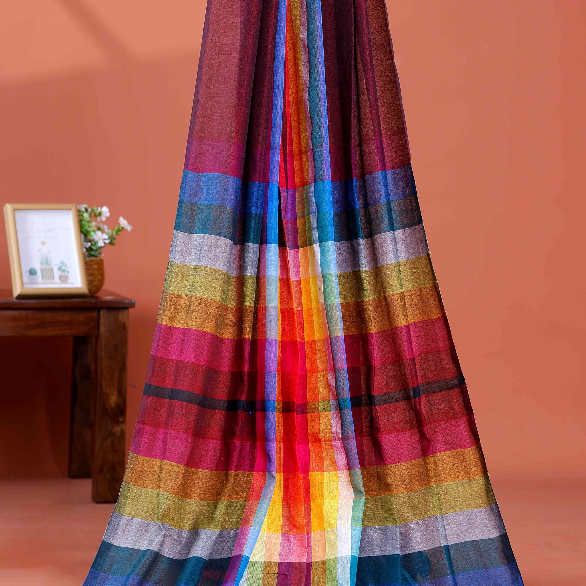 Handloom Mul Mul Cotton Saree with Vertical Stripe Pattern and Decorative Tassels - Maroon