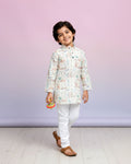 Boys green kurta adorned with traditional Bandhani-inspired patterns in red and gold., Multi