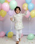 Boys green kurta adorned with traditional Bandhani-inspired patterns in red and gold., Multi