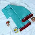 Aqua Green Mangalagiri Cotton Saree With A Contrasting Red Woven Border And Traditional Pallu Design