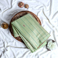 Banana Pith Saree in Green with Subtle Stripes and Elegant Woven Details