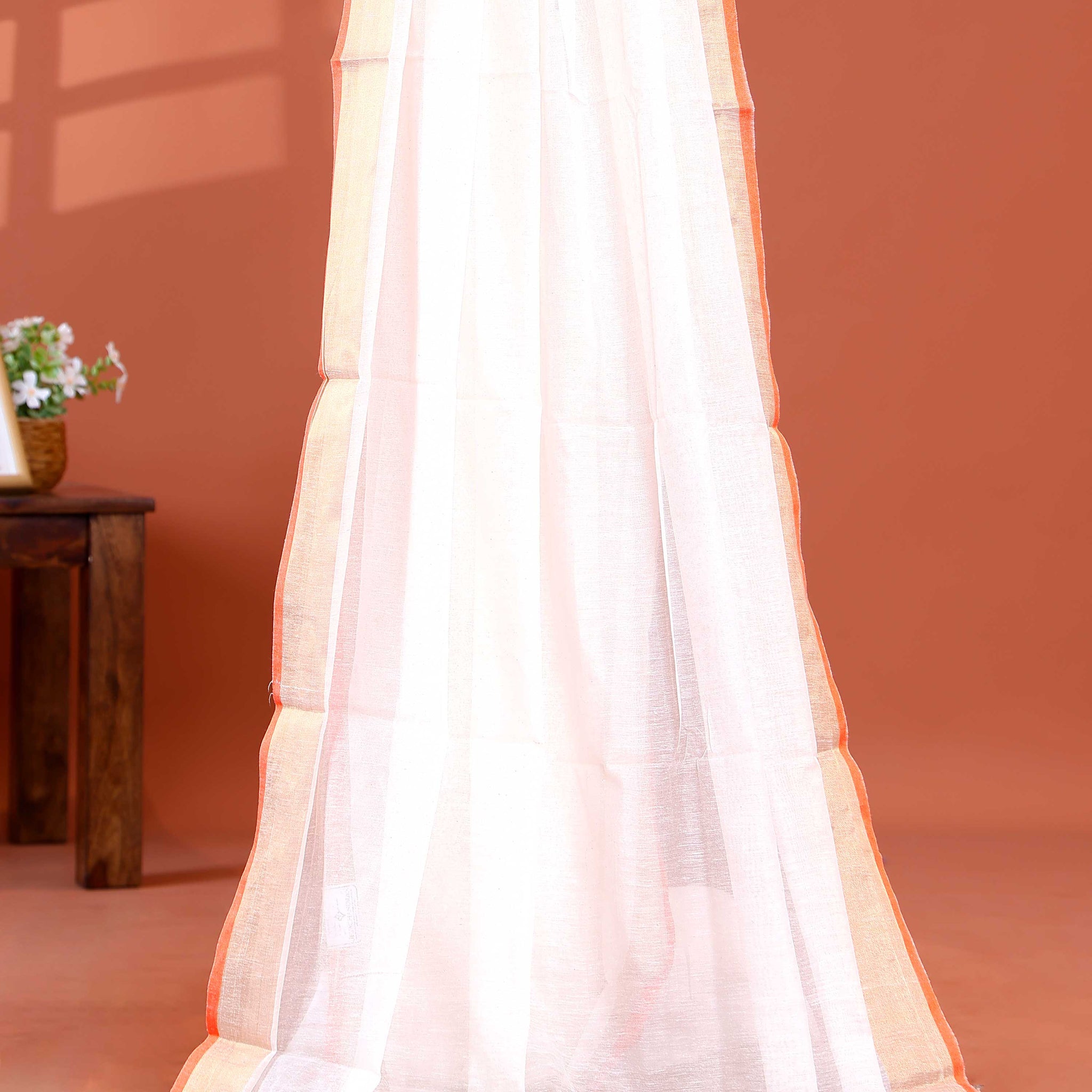 Handwoven Mul Mul Cotton Saree with Tassel Detailing and Contrasting Border - White
