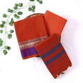 Womens Ethnic Unstitched Salwar Material With Elephant Zari Border Orange Color And Blue Contrast Accents Top View
