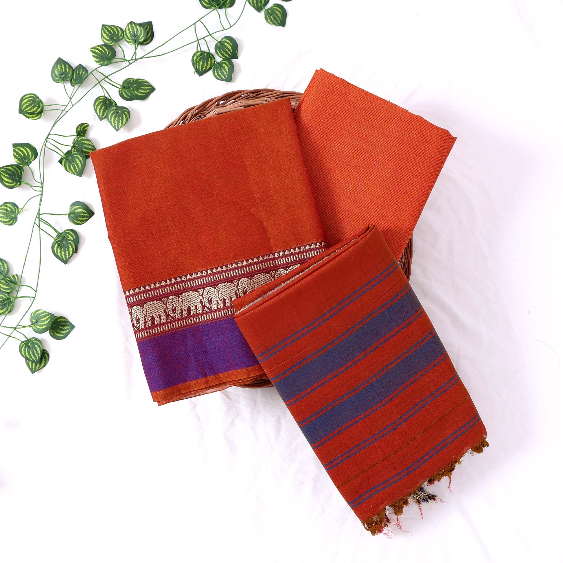 Womens Ethnic Unstitched Salwar Material With Elephant Zari Border Orange Color And Blue Contrast Accents Top View