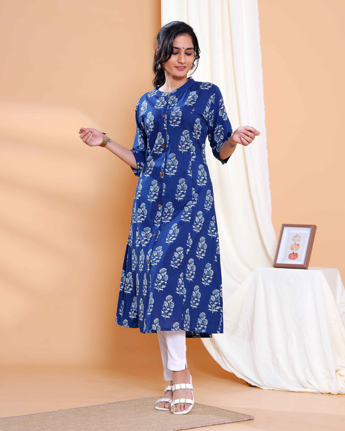 Navy Blue Floral Printed A-Line Kurta with Round Neck and Button Detailing