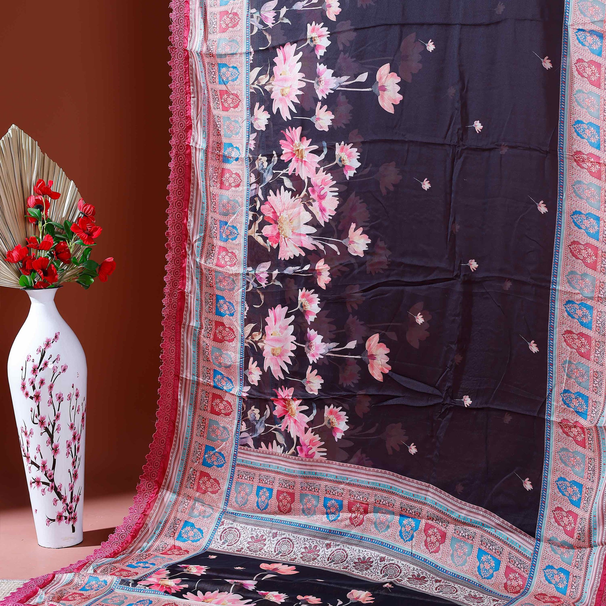 Stylish Georgette Saree with Bold Floral Prints and Traditional Patterned Border - Black