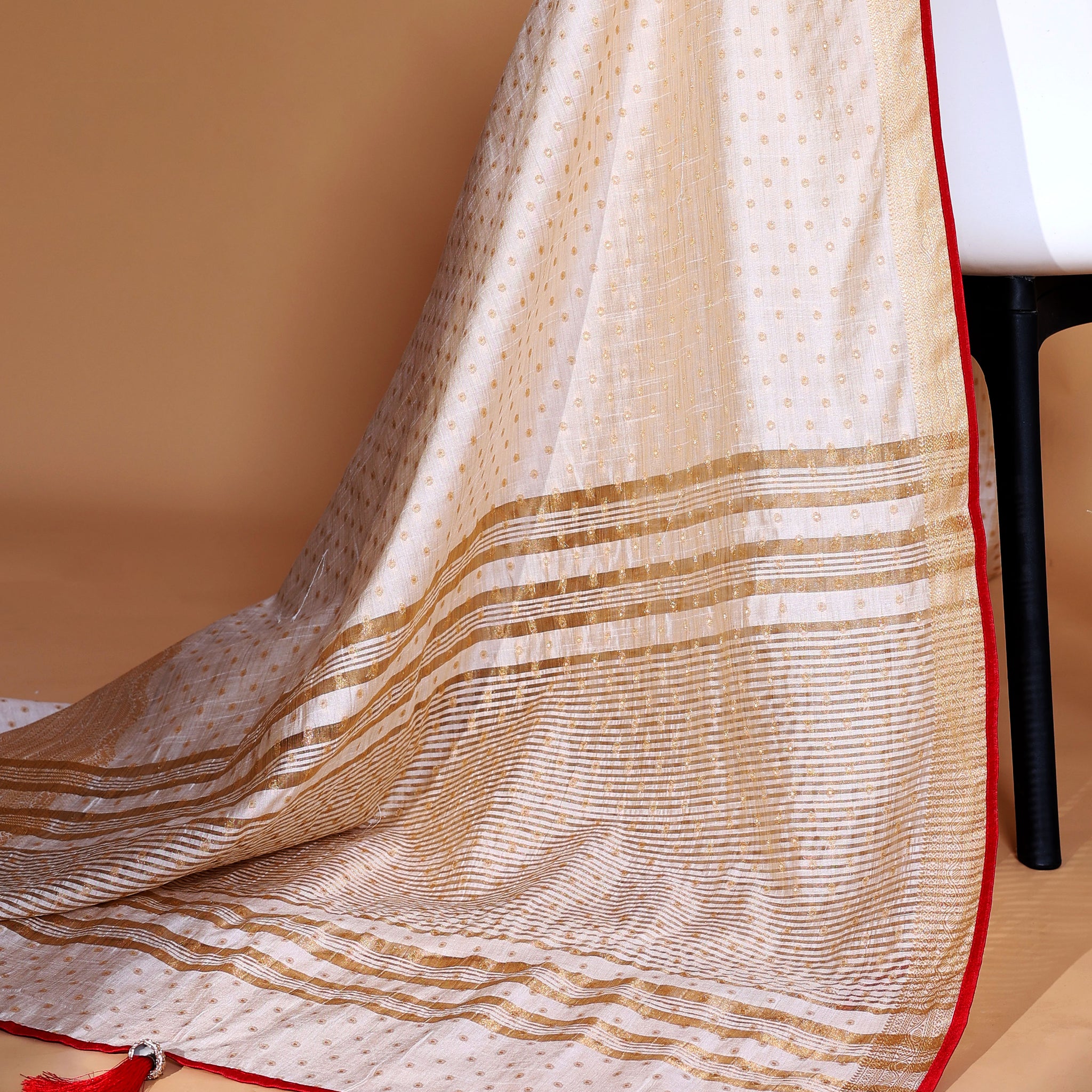 Off White  Art Silk Saree with Golden Zari & Buti Pattern Enhanced with Red Border Without Blouse