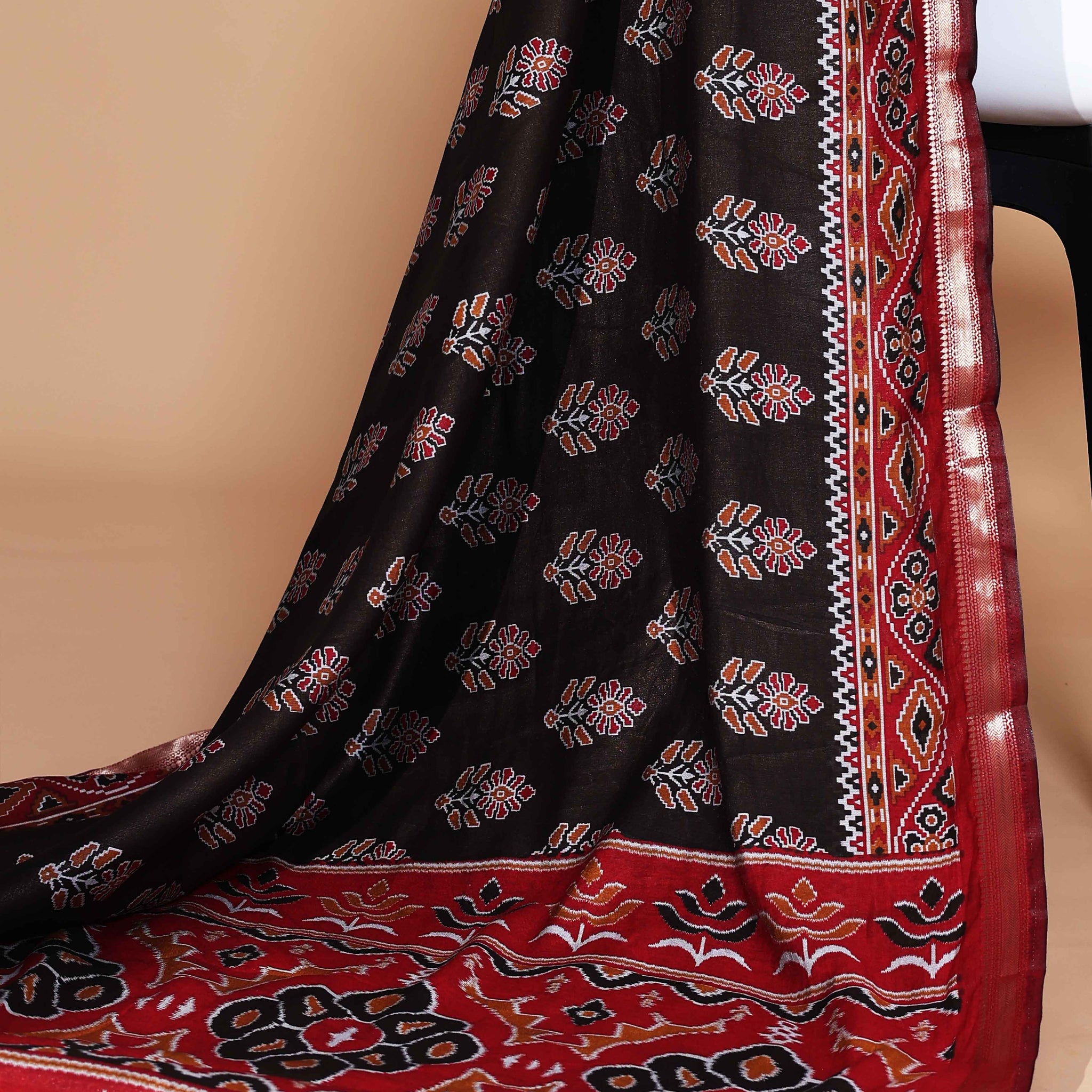 Black Patola Silk Saree with Intricate Floral Motifs