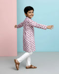 Boys green kurta adorned with traditional Bandhani-inspired patterns in red and gold., Purple