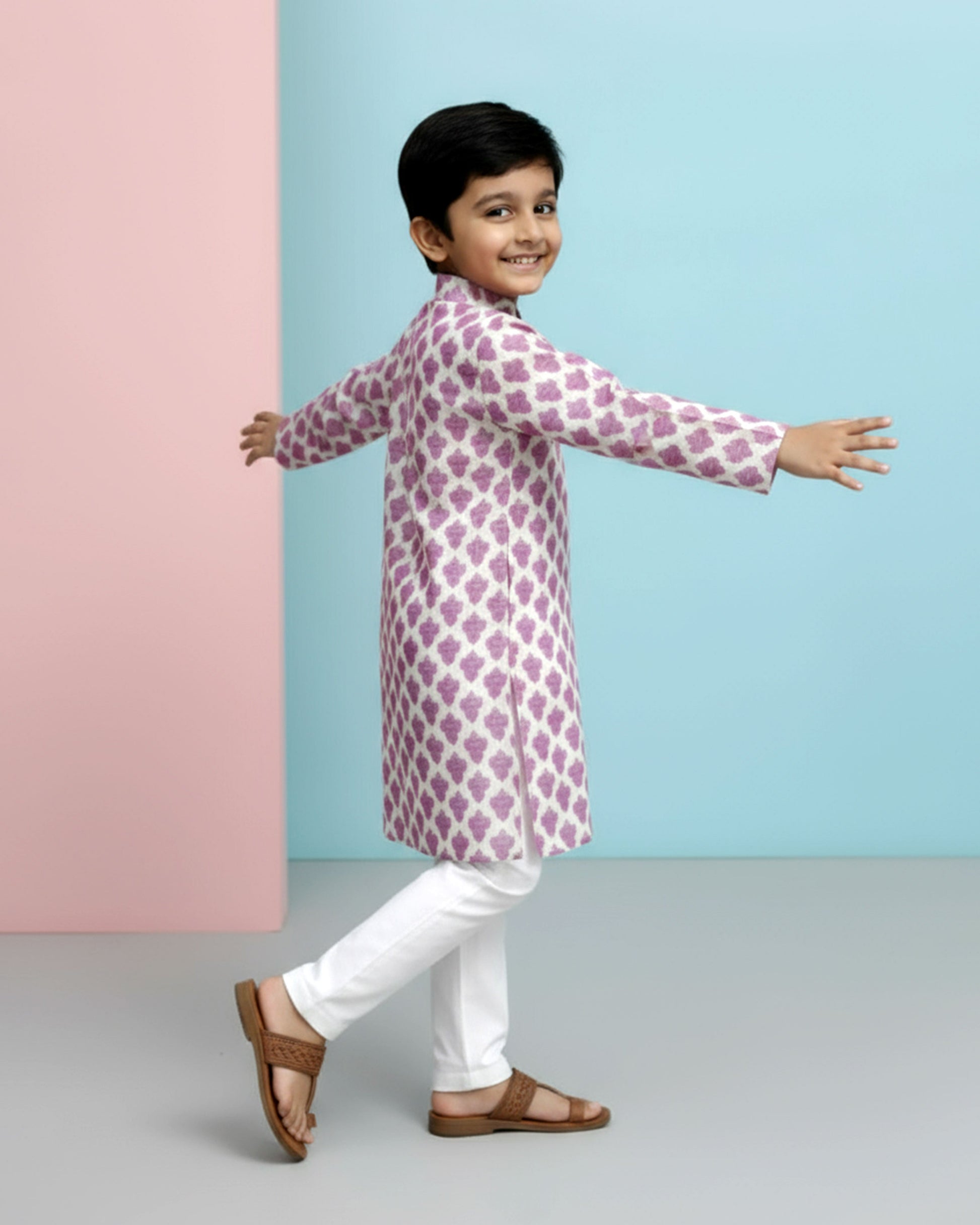 Boys green kurta adorned with traditional Bandhani-inspired patterns in red and gold., Purple