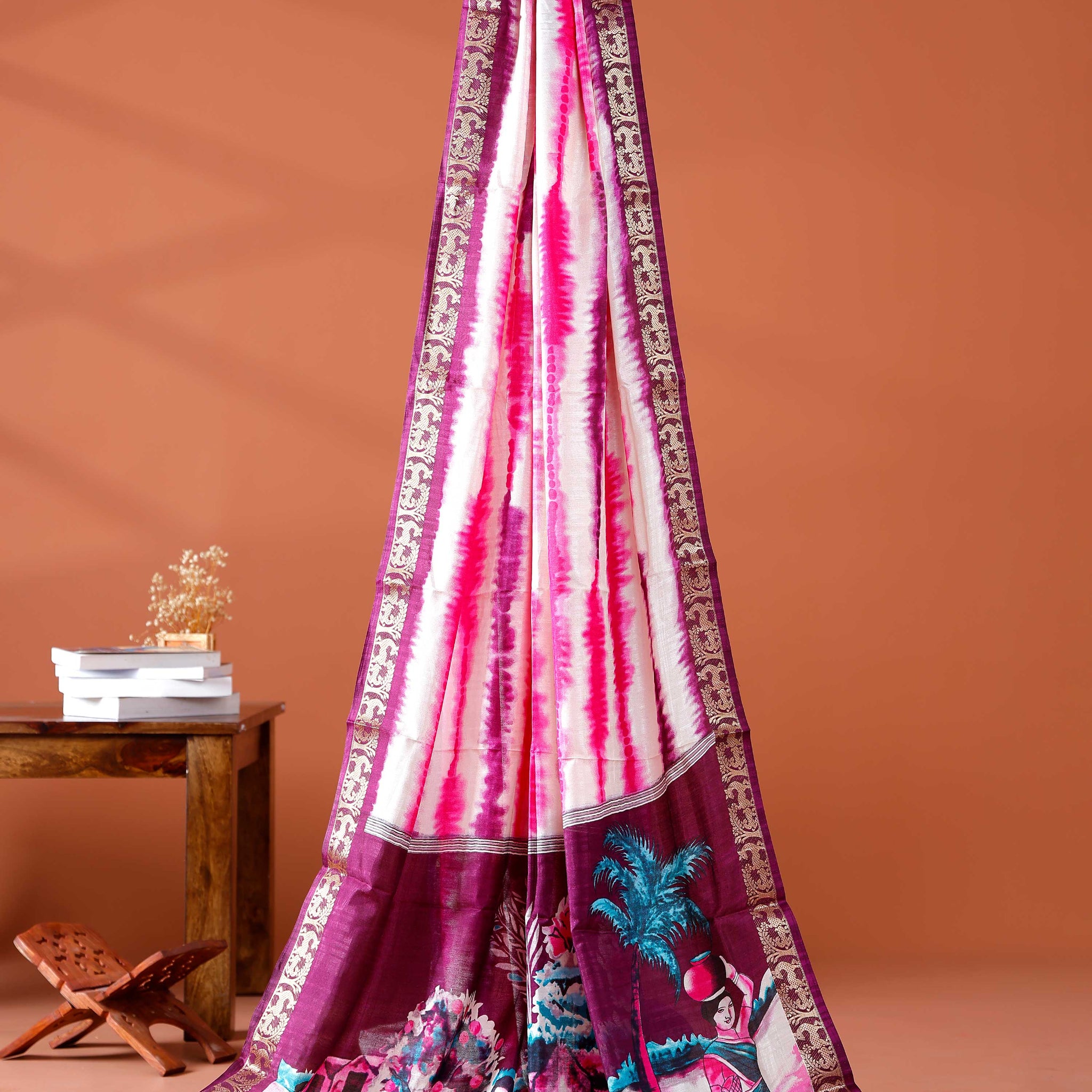 Elegant Pink shades and the rural scenic artwork Dola Saree