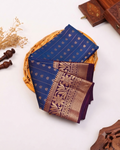Elegant Traditional Silk Saree with Delicate Zari Buttas Linear Pattern Weaving and Ornate Floral Border- Blue
