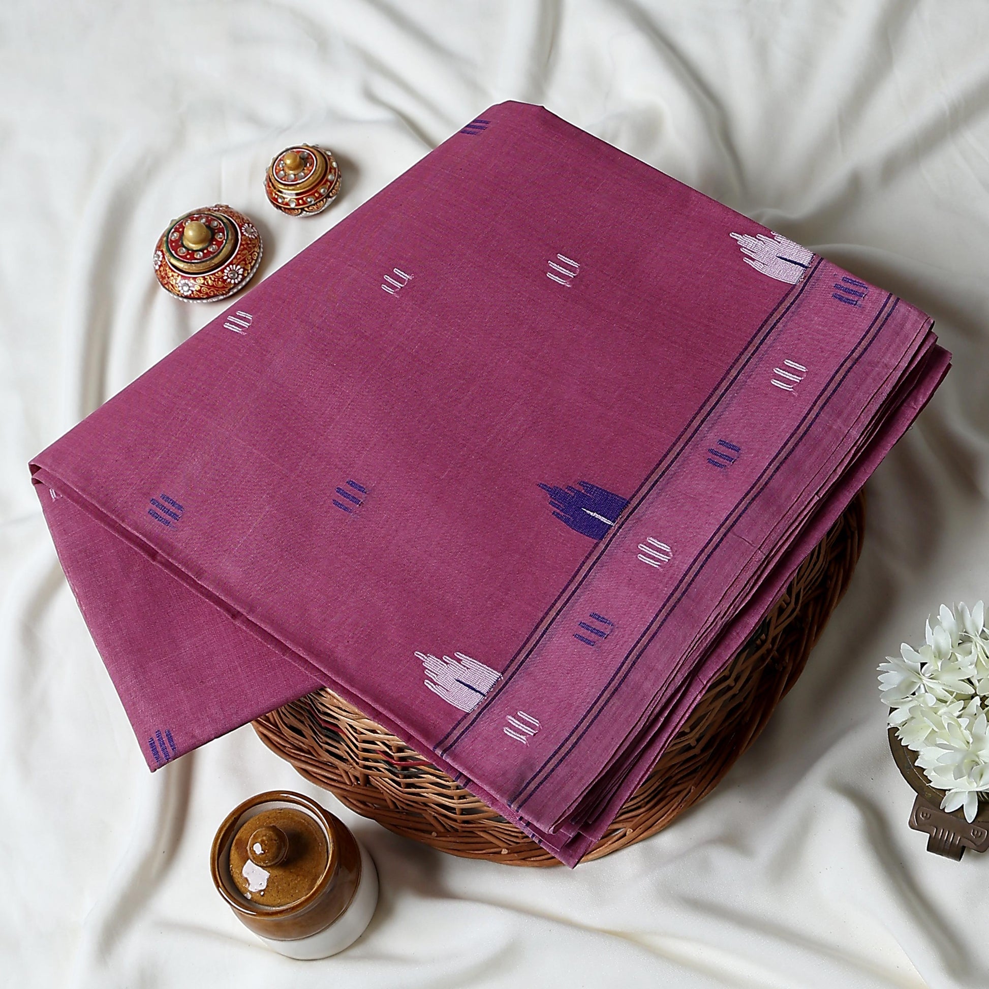 Bengal Cotton Saree With Traditional Woven Motifs And Contrast Border In  Onion Pink Folded Front View