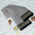 Grey Mangalagiri Cotton Saree With Traditional Woven Border And Contrast Edge - Top Folded View