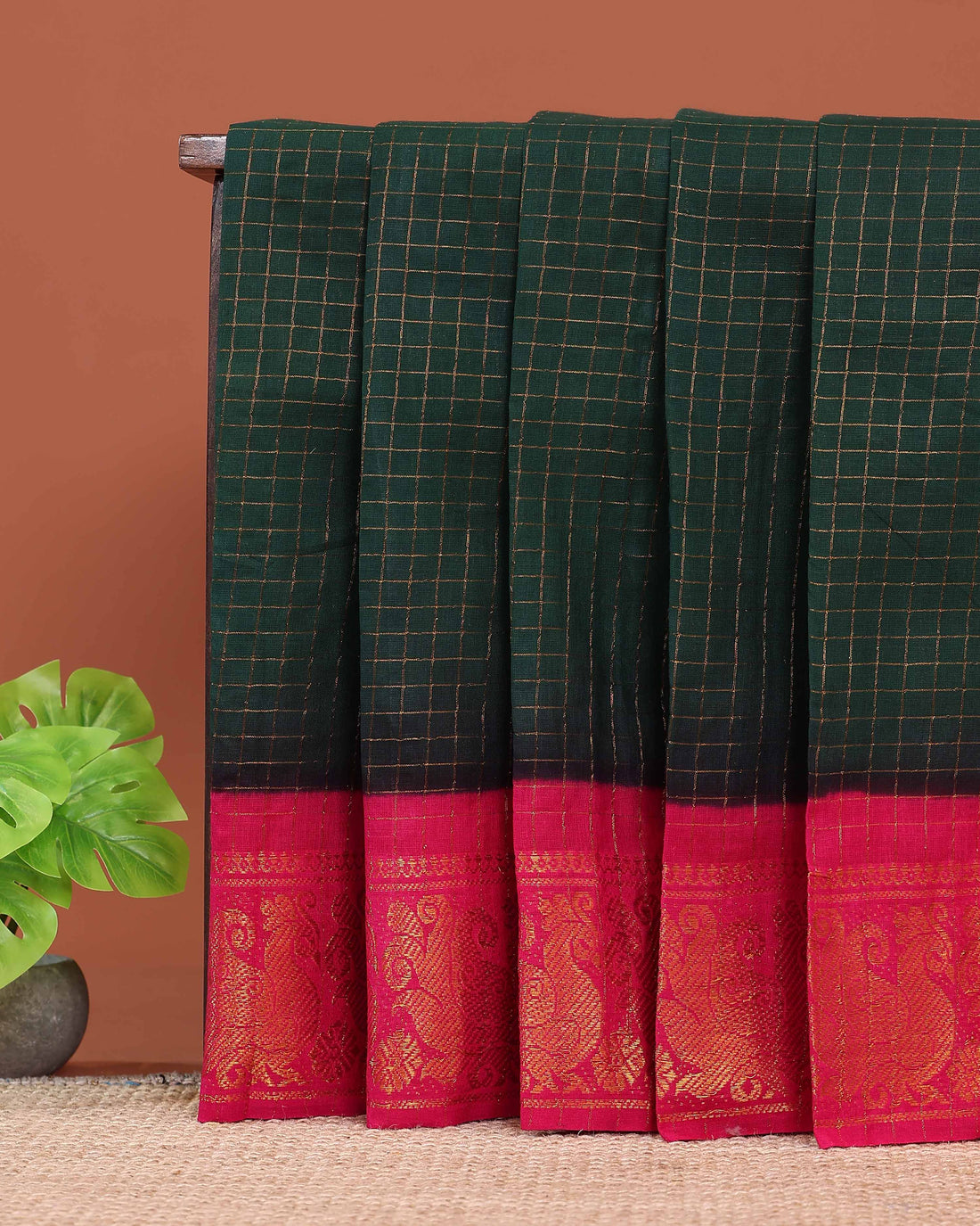 Elegant Sungudi Cotton Saree with Zari Checks and Contrast Peacock Motif Border - Dark Green