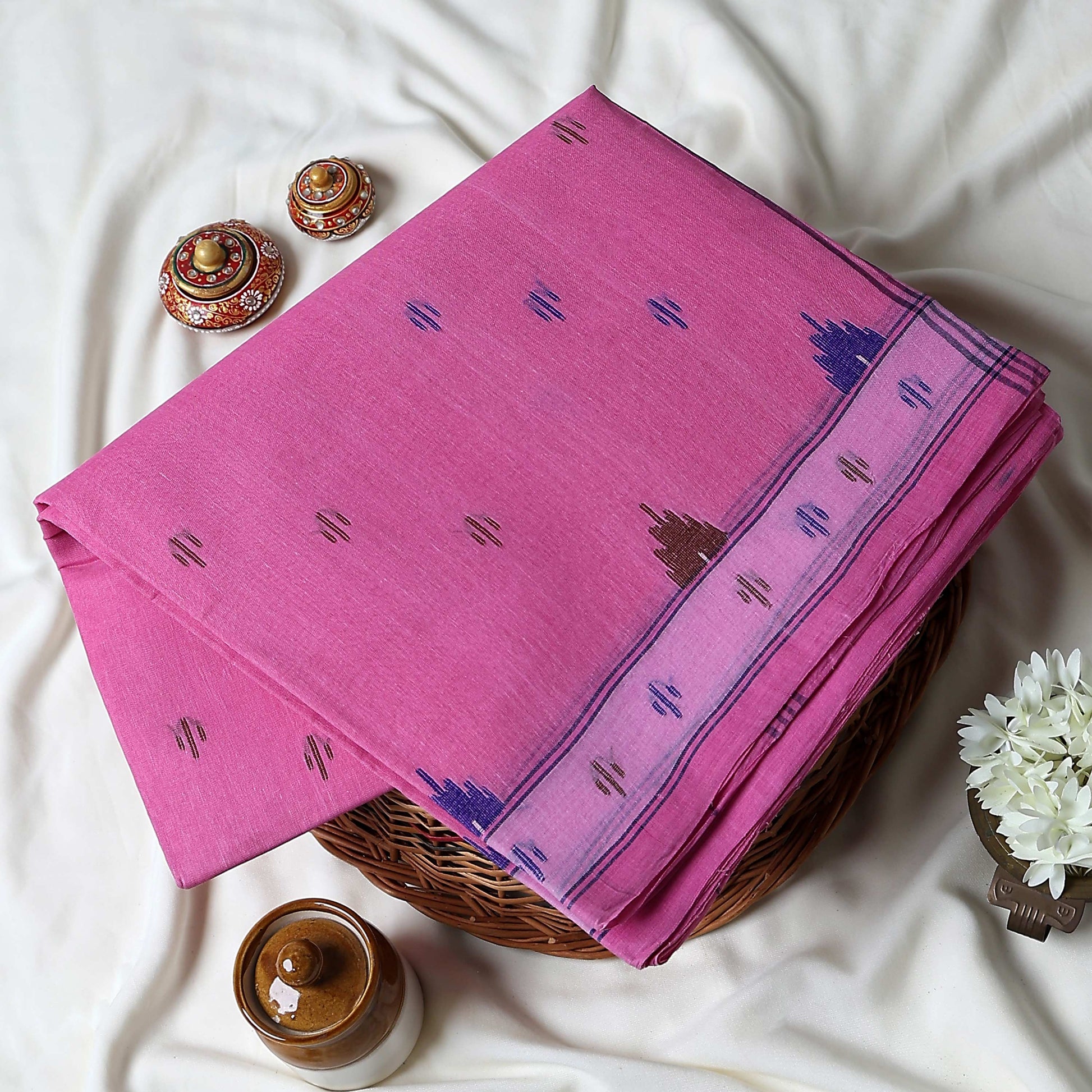Bengal Cotton Saree With Traditional Woven Motifs And Contrast Border In  Light Pink Folded Front View