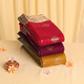 Elampillai silk cotton saree with silver zari floral buttas, vertical stripes and contrast zari border folded stack view