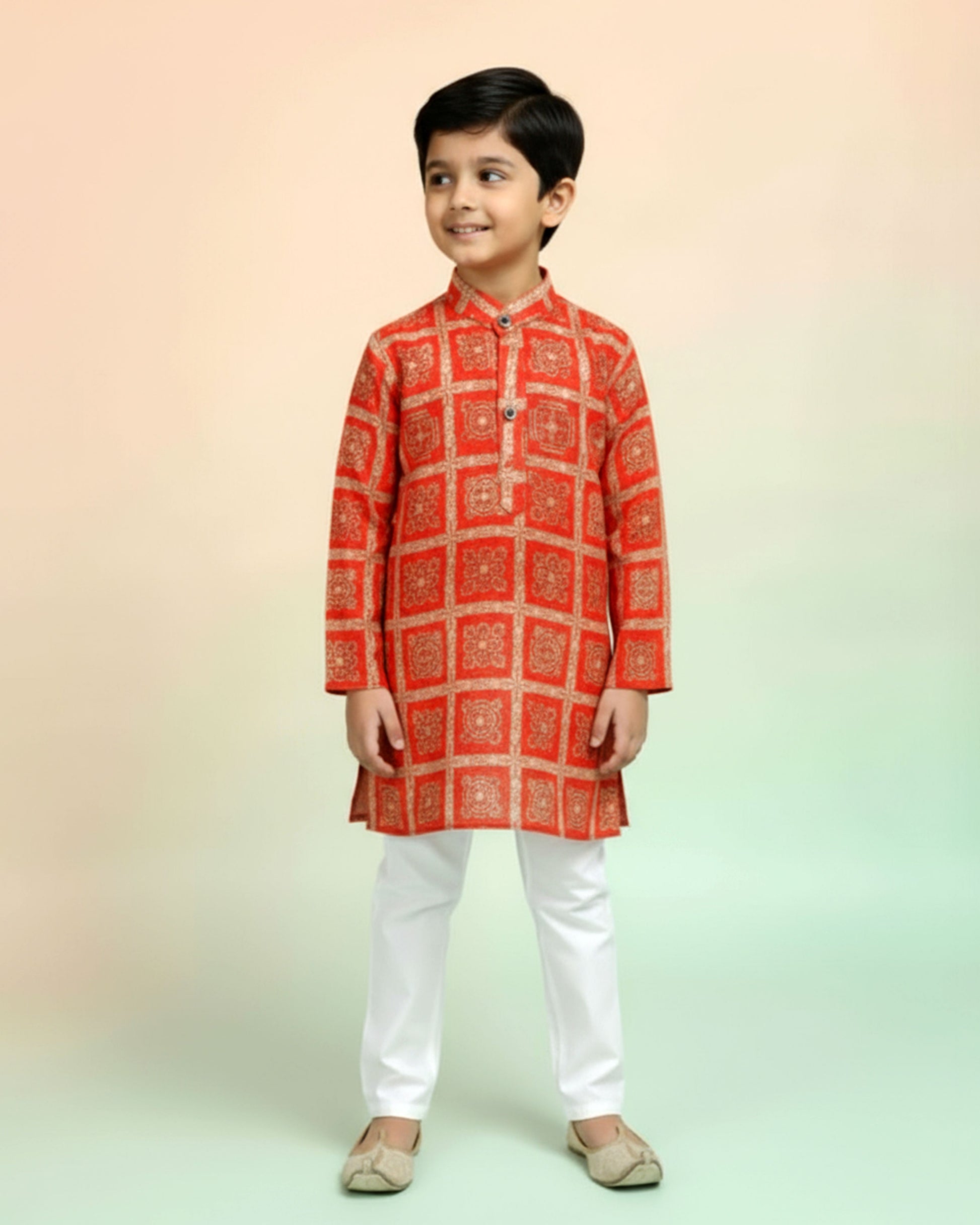 Boys green kurta adorned with traditional Bandhani-inspired patterns in red and gold., Orange