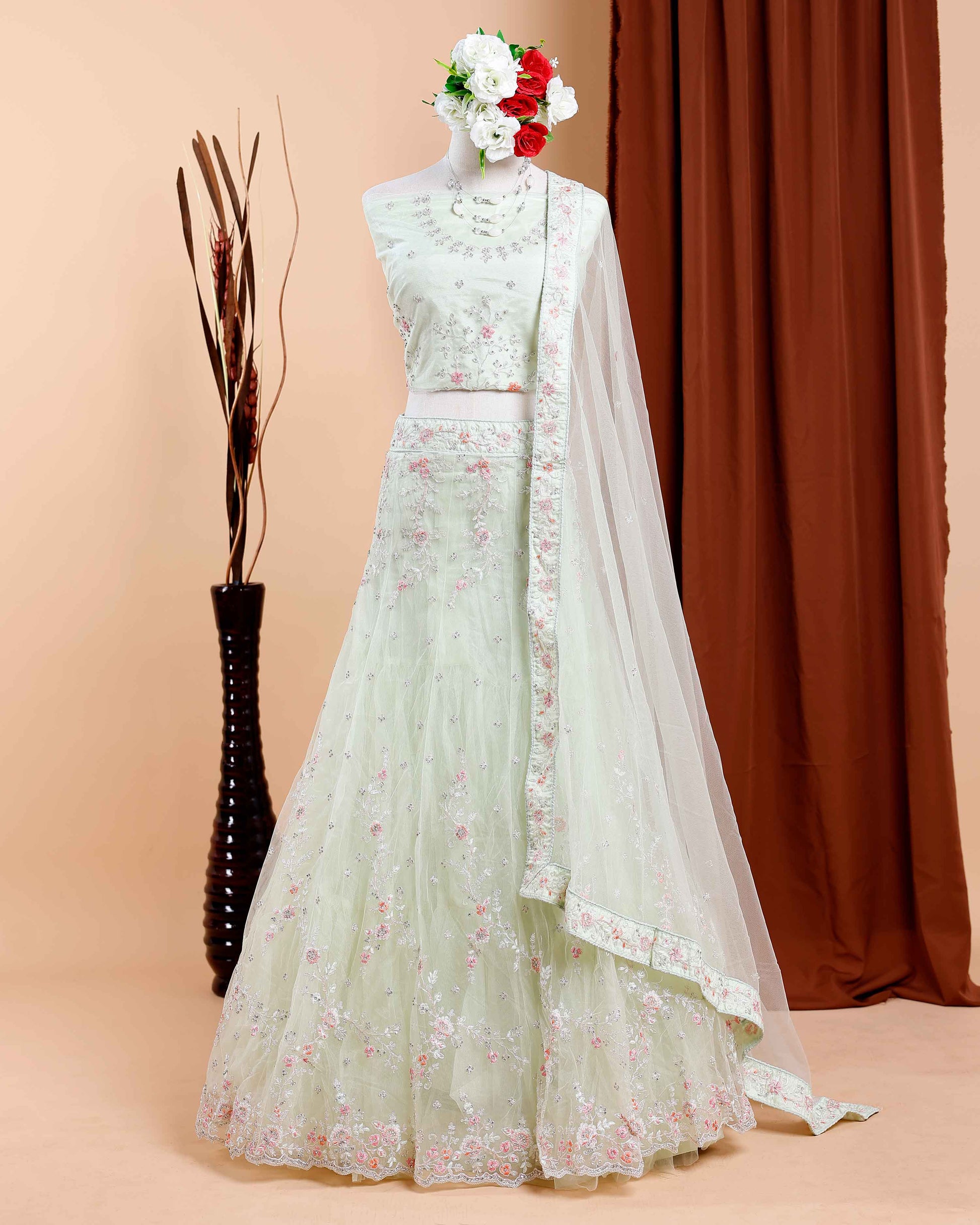 Embroidered Semi-Stitched Net Lehenga Choli with Dupatta featuring Floral Sequins Green