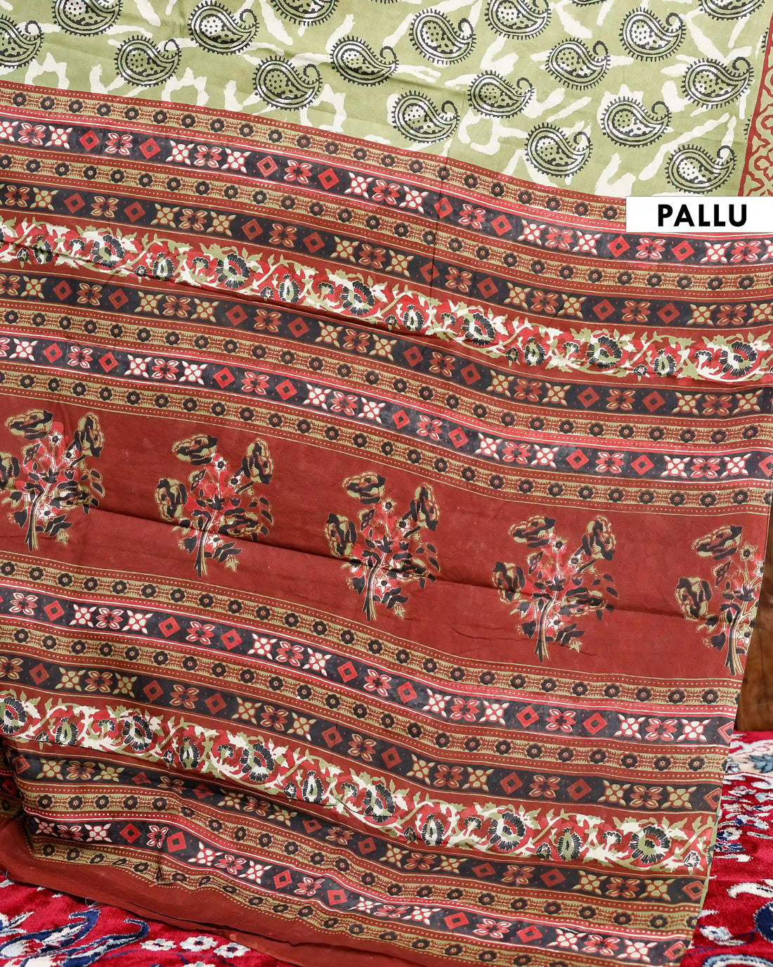 Hand Block Printed Mul Mul Cotton Saree with Paisley Motifs and Geometric Border - Green