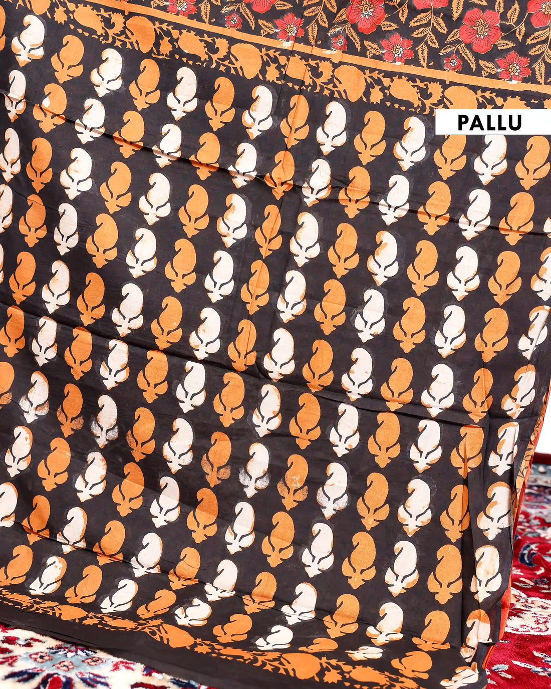Hand Block Printed Mul Mul Cotton Saree with Floral & Leaf Motifs and Intricate Border Design  - Black