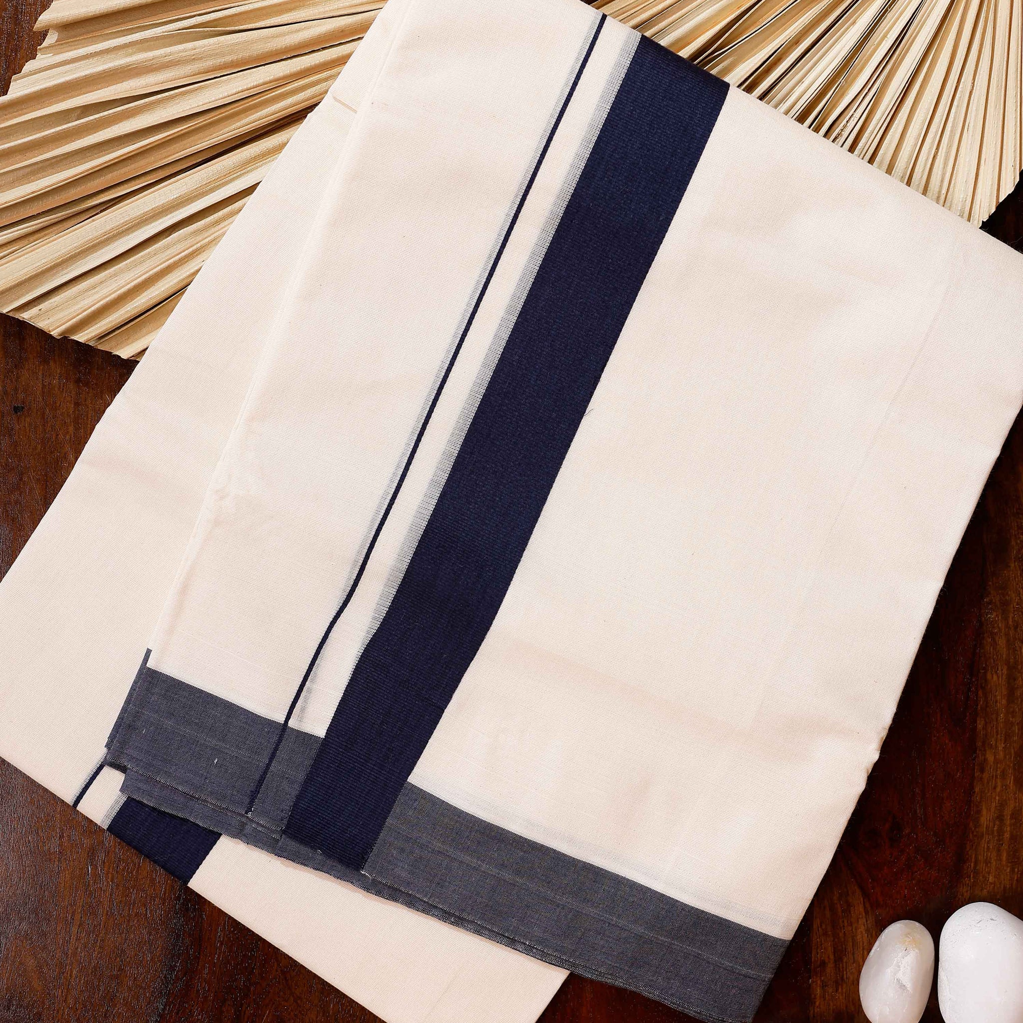 Traditional Handwoven Cotton Dhoti with Navy Blue Border and Elegant Finish - Off White