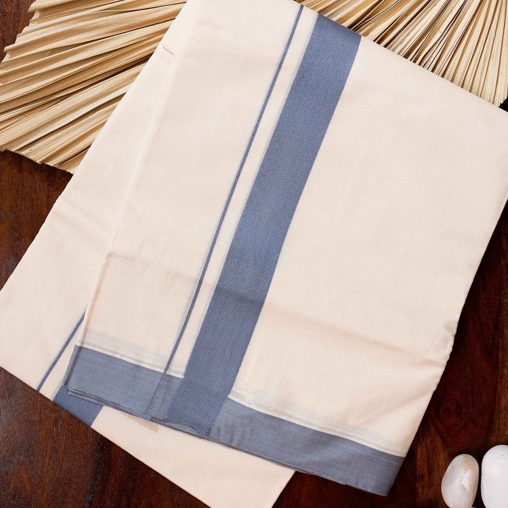 Traditional Handwoven Cotton Dhoti with Light Blue Border and Elegant Finish - Off White