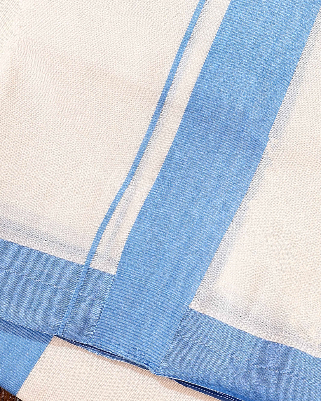 Traditional Handwoven Cotton Dhoti with Blue Border and Elegant Finish - Off White