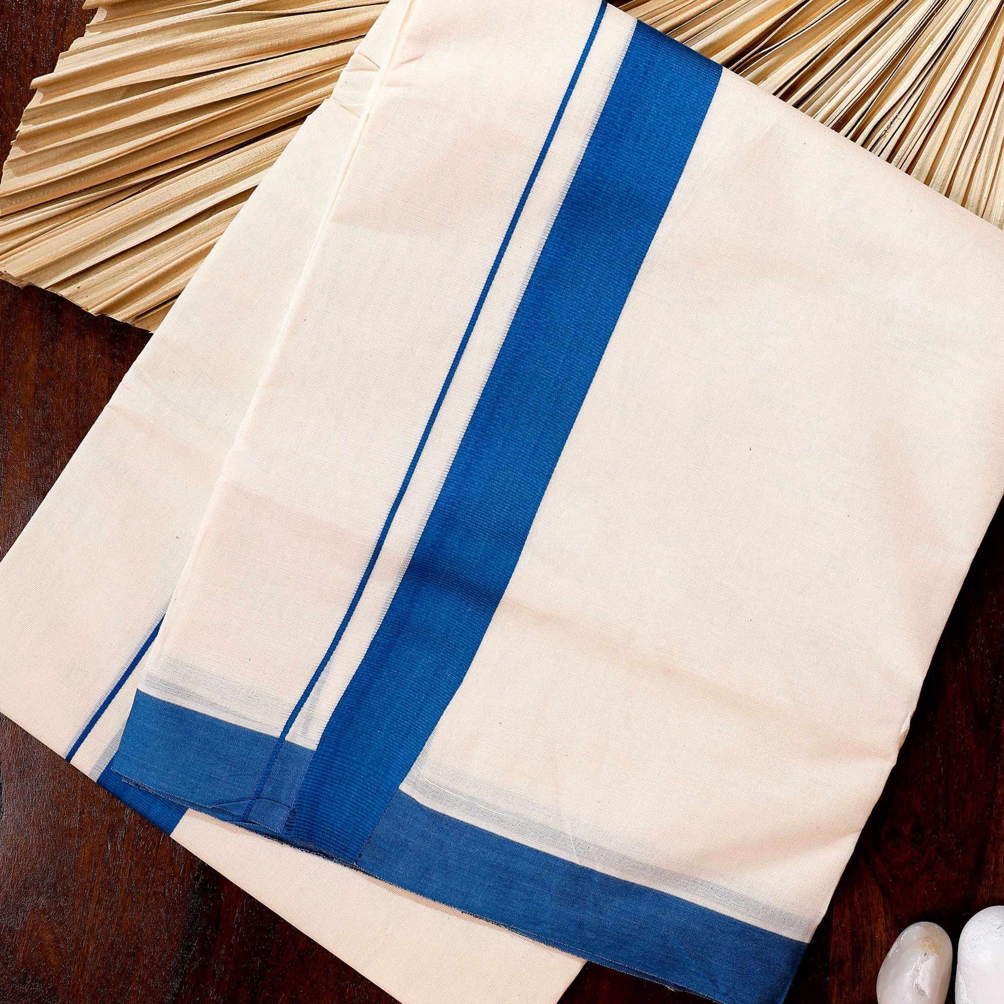 Traditional Handwoven Cotton Dhoti with Blue Border and Elegant Finish - Off White