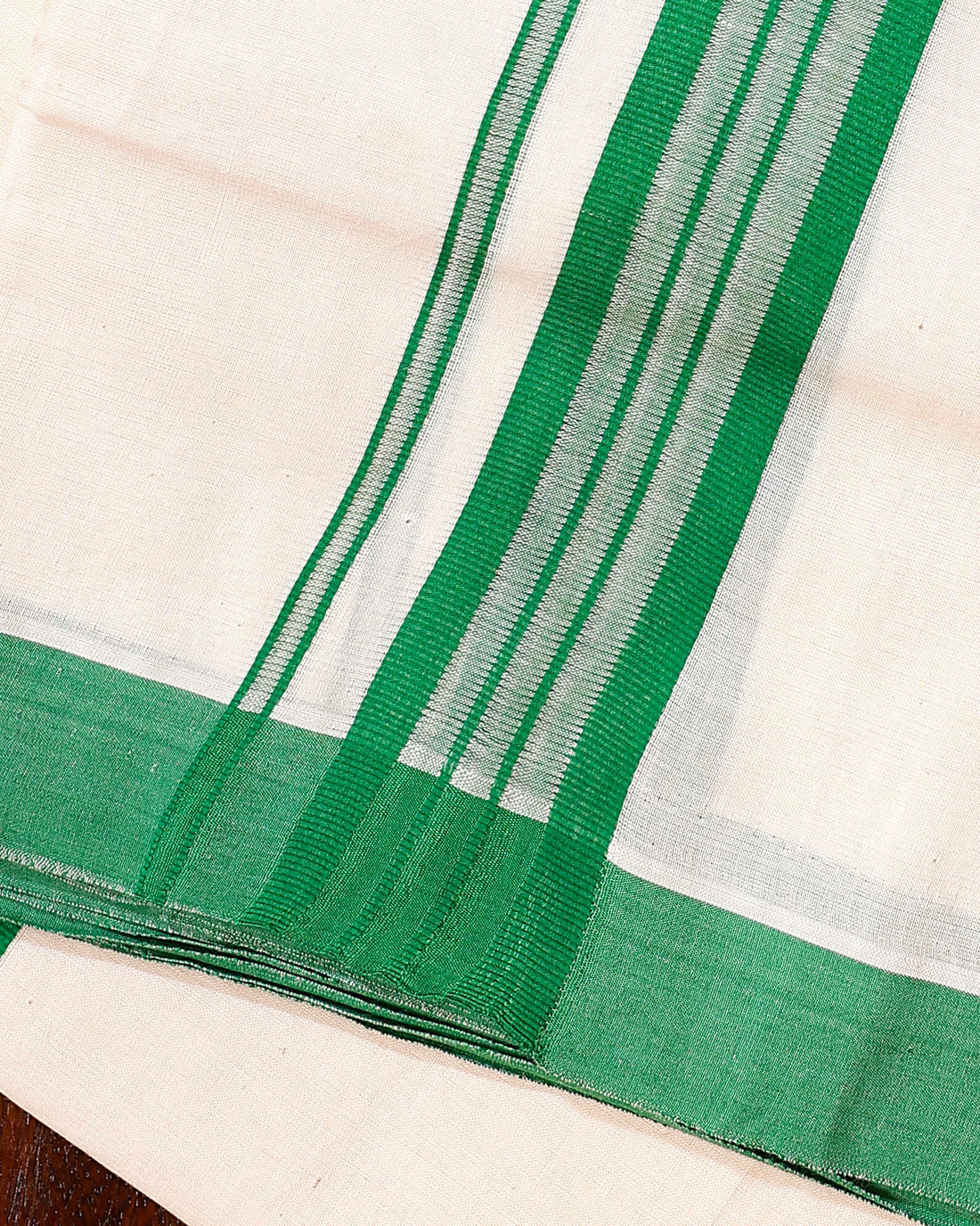 Traditional Handwoven Cotton Dhoti with Green Border and Elegant Finish - Off White
