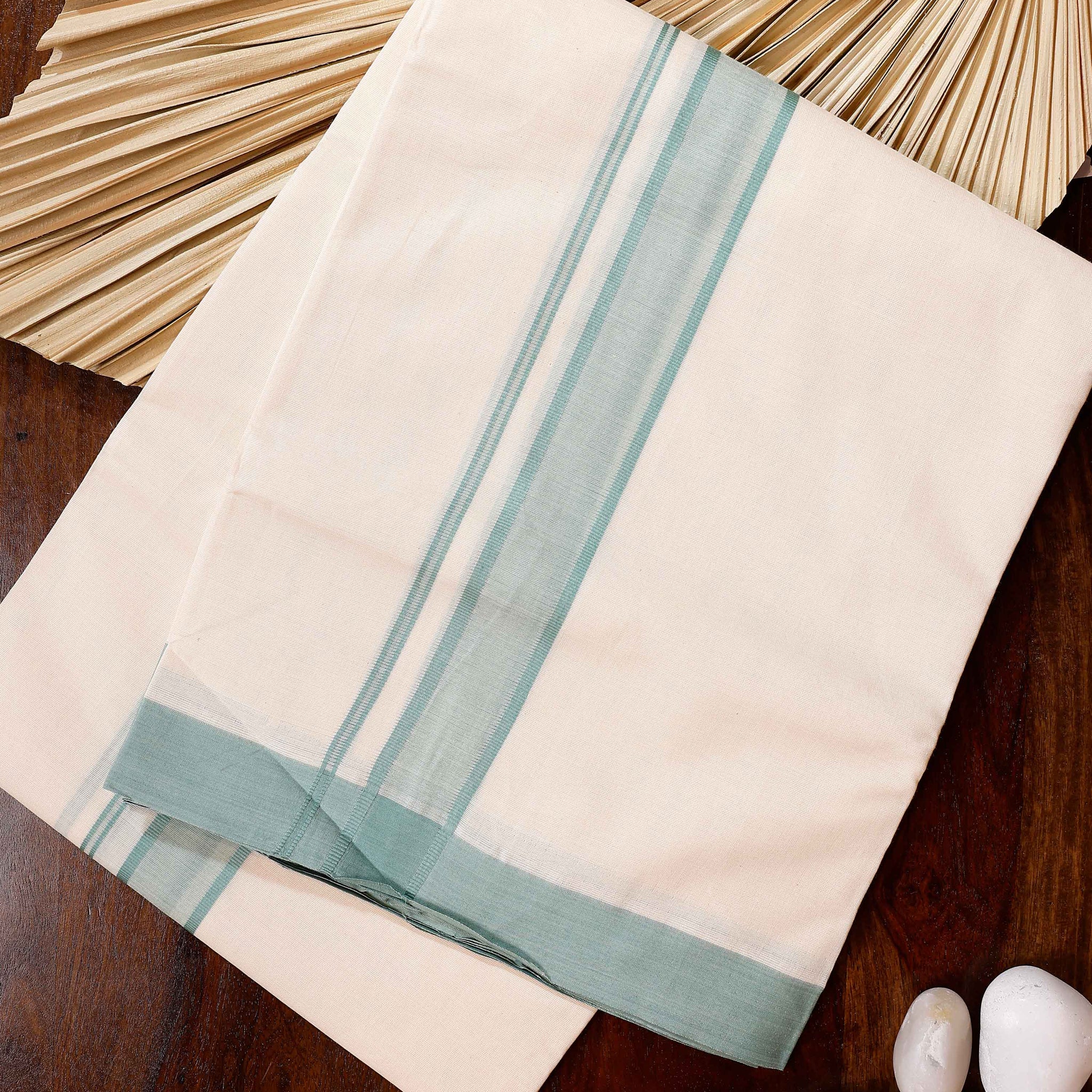 Traditional Handwoven Cotton Dhoti with Light Green Border and Elegant Finish - Off White