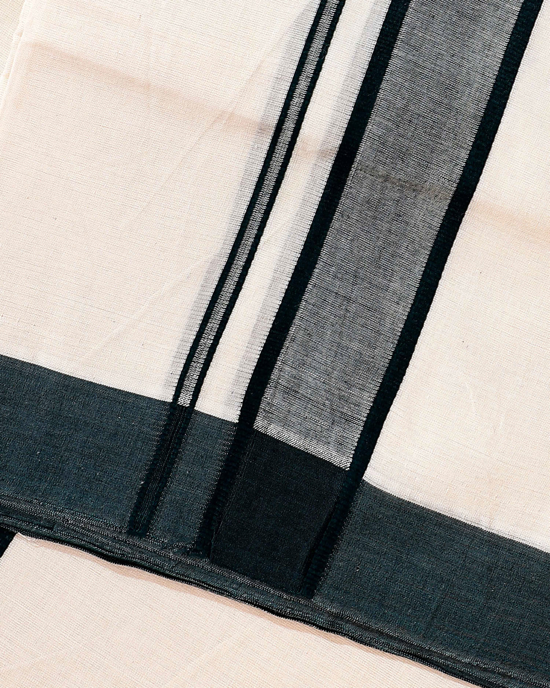 Traditional Handwoven Cotton Dhoti with Dark Green Border and Elegant Finish - Off White