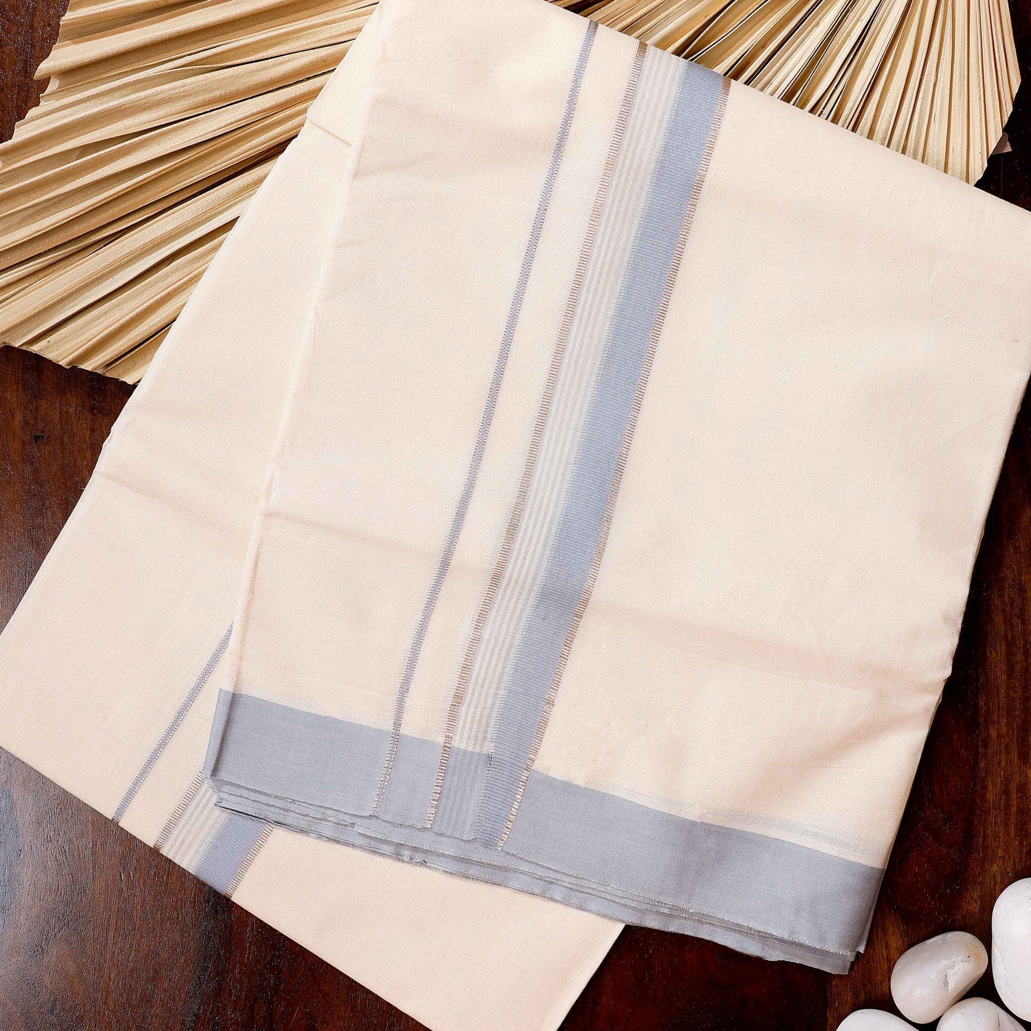 Traditional Handwoven Cotton Dhoti with Light Blue Border and Elegant Finish - Off White