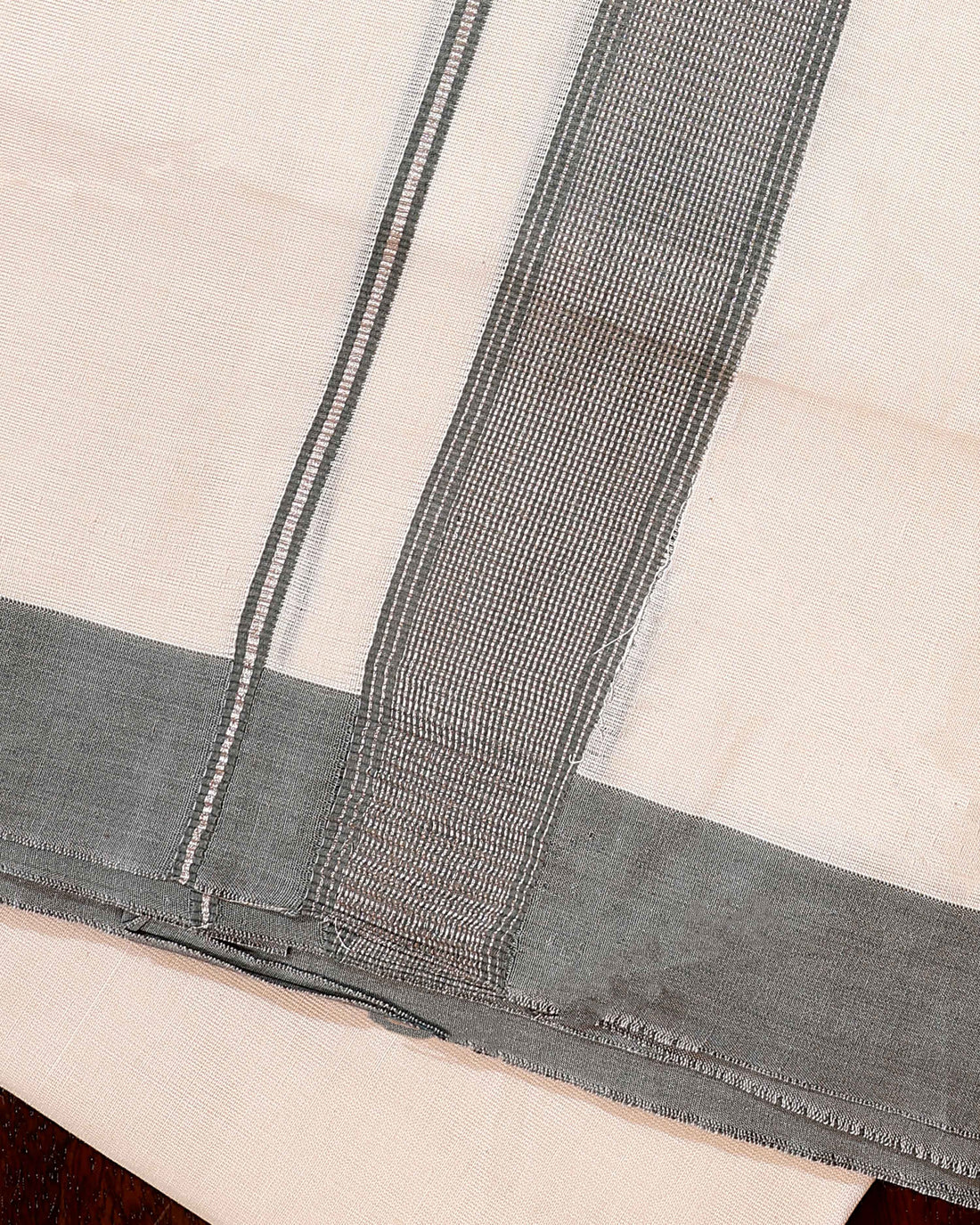 Traditional Handwoven Cotton Dhoti with Dark Grey Border and Elegant Finish - Off White