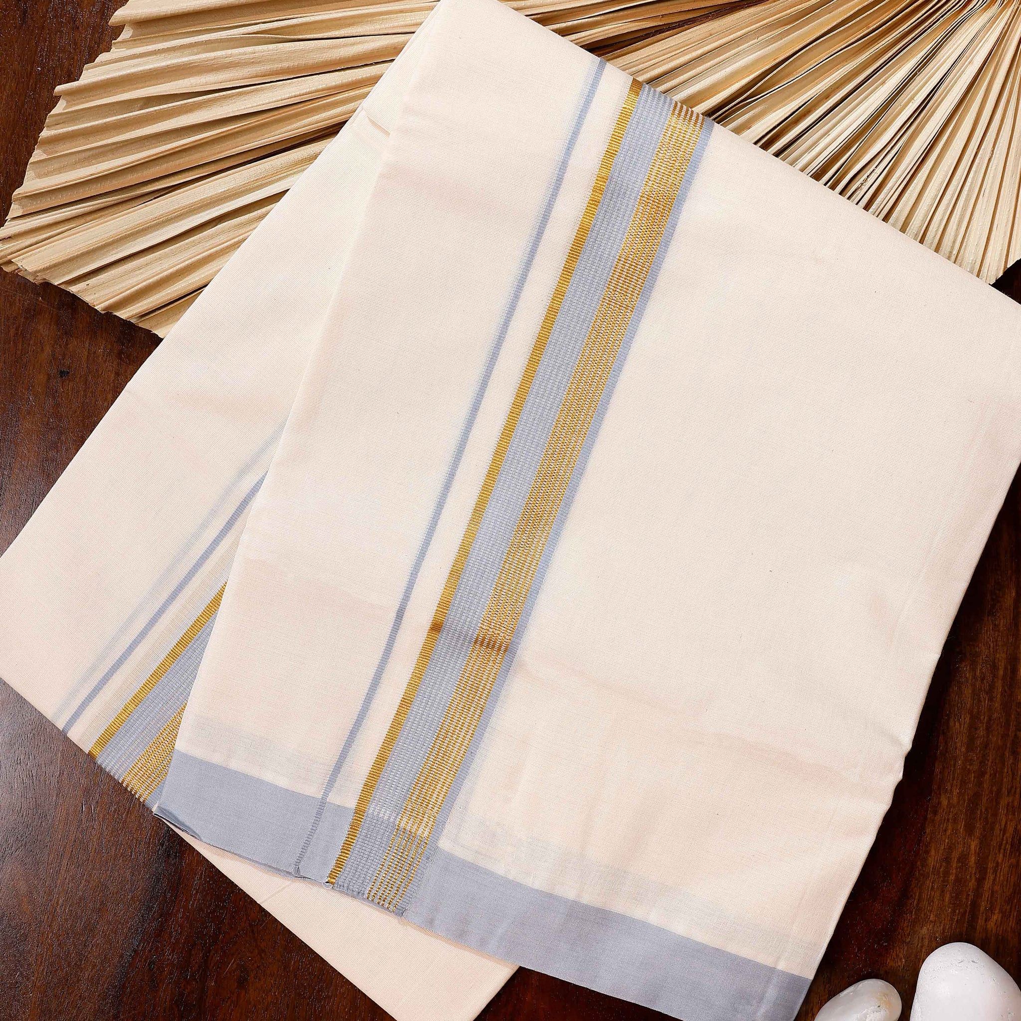 Traditional Handwoven Cotton Dhoti with Light Blue Border and Elegant Finish - Off White