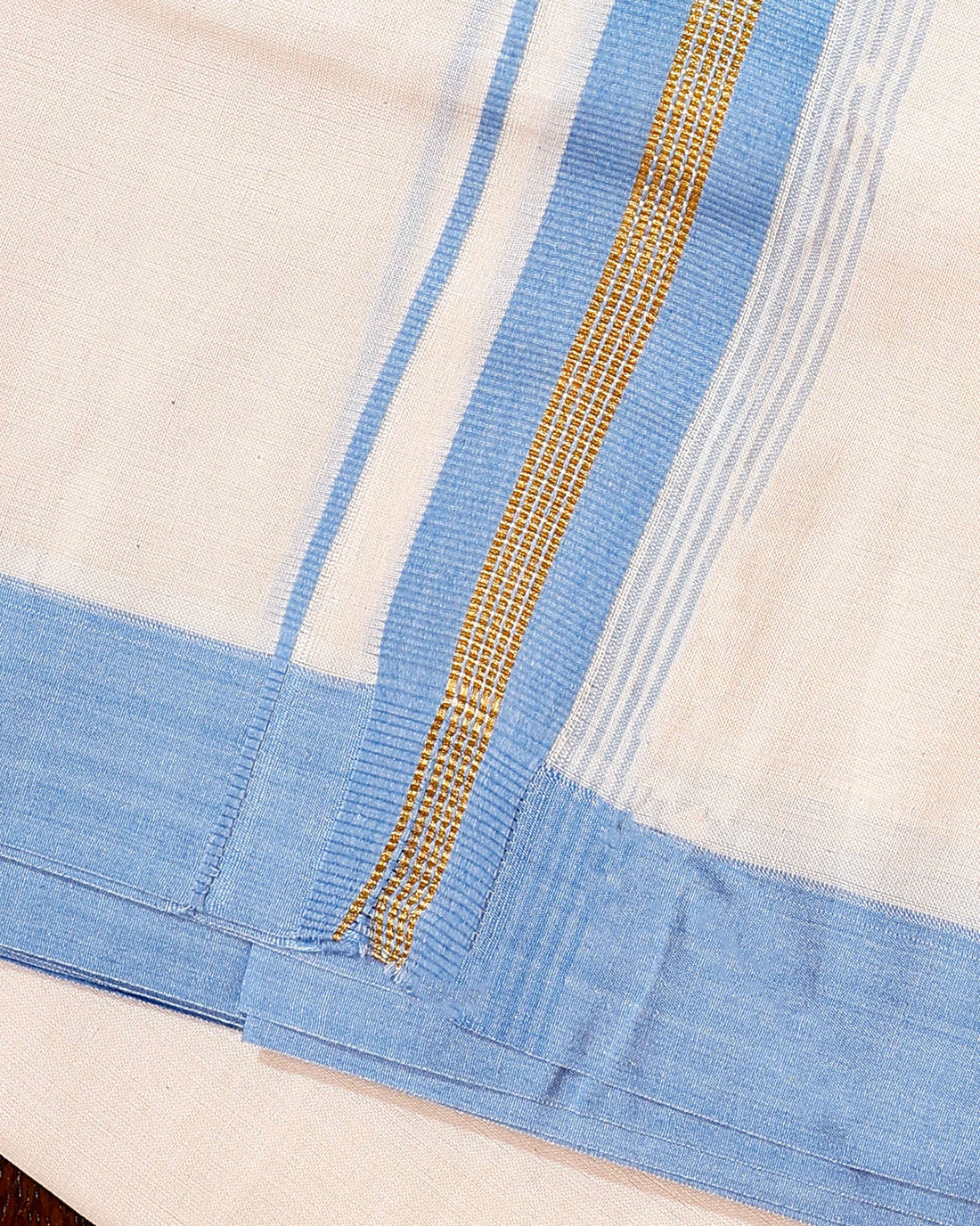 Traditional Handwoven Cotton Dhoti with Blue Border and Elegant Finish - Off White